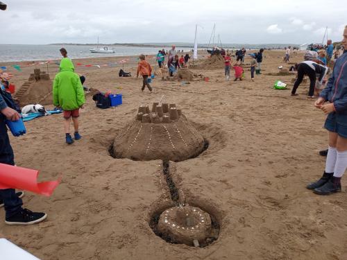 Photo Gallery Image - Sand Castle competition- Community on Show. Photo credit Sally Beer