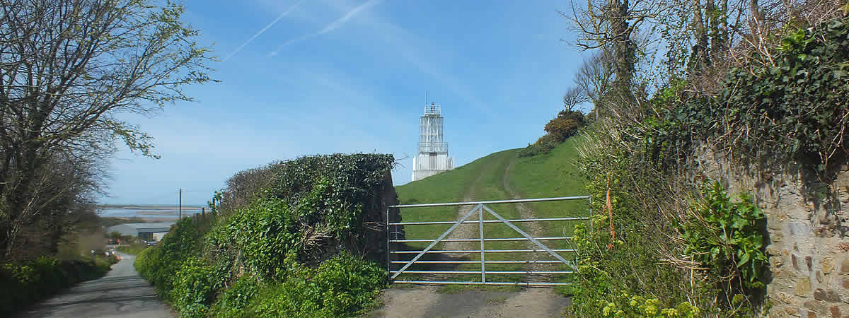 Lane running past one of the Leading Lights at Instow