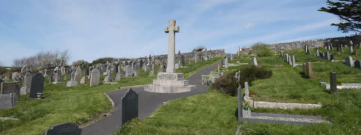 The War Memorial in the graveyard at St John The Baptist Church, Instow